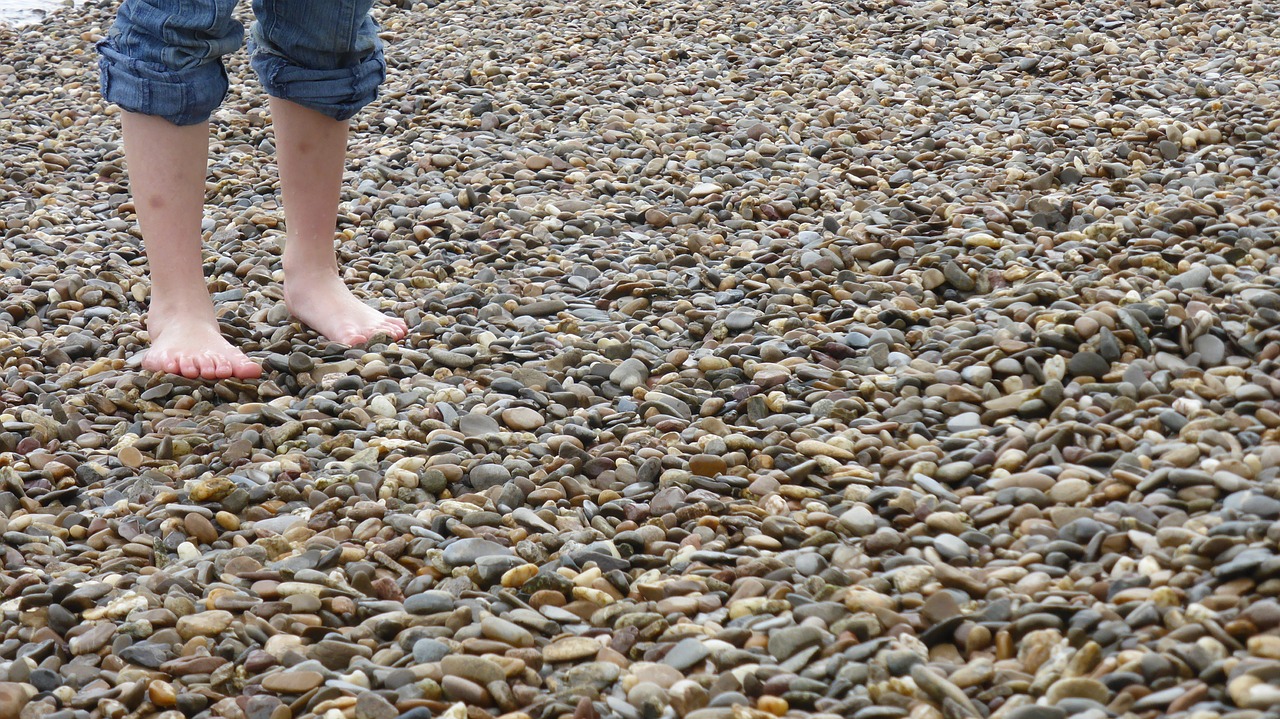 barefoot pebble foot free photo