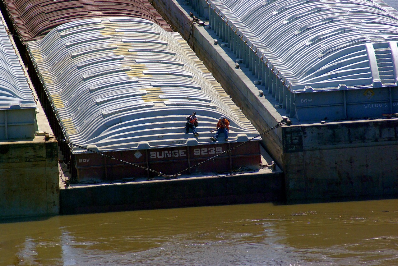 barges on arkansas river  barge  river free photo