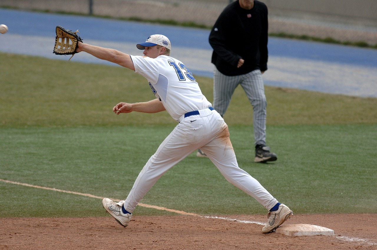 baseball player first baseman ball free photo