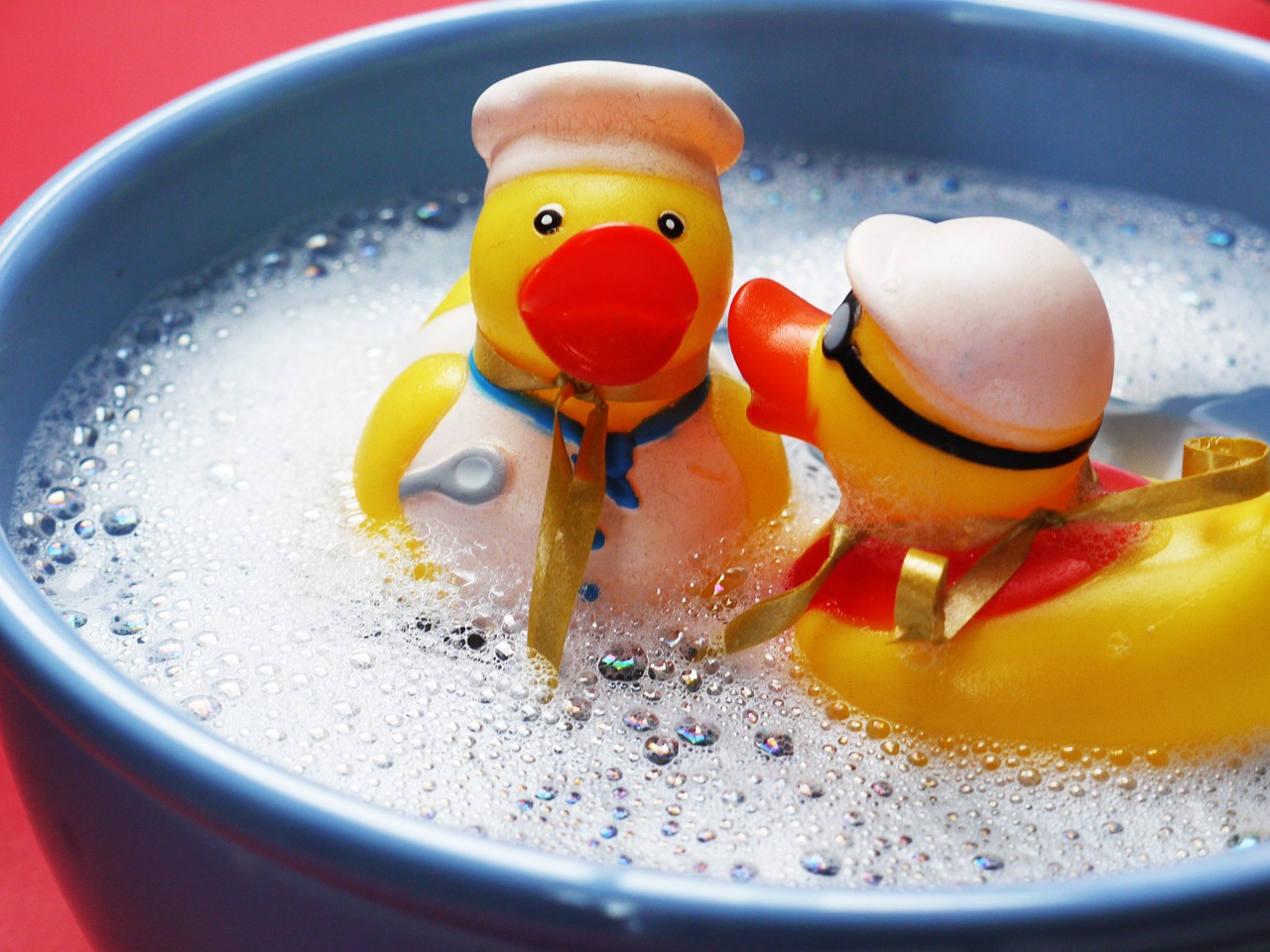 bath splashing ducks free photo