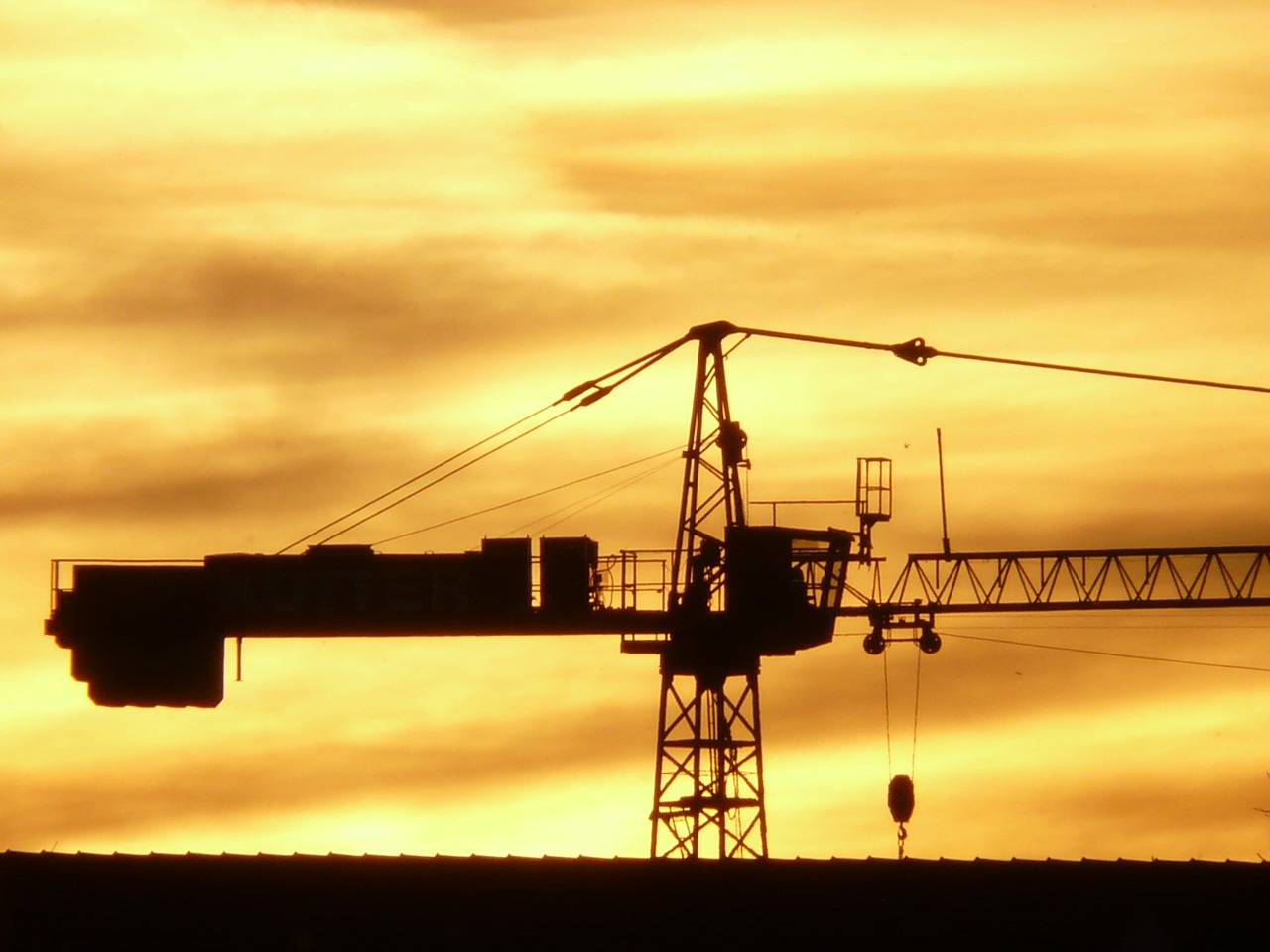 baukran,crane,technology,sunset,back light,site,golden,free pictures, free photos, free images, royalty free, free illustrations, public domain