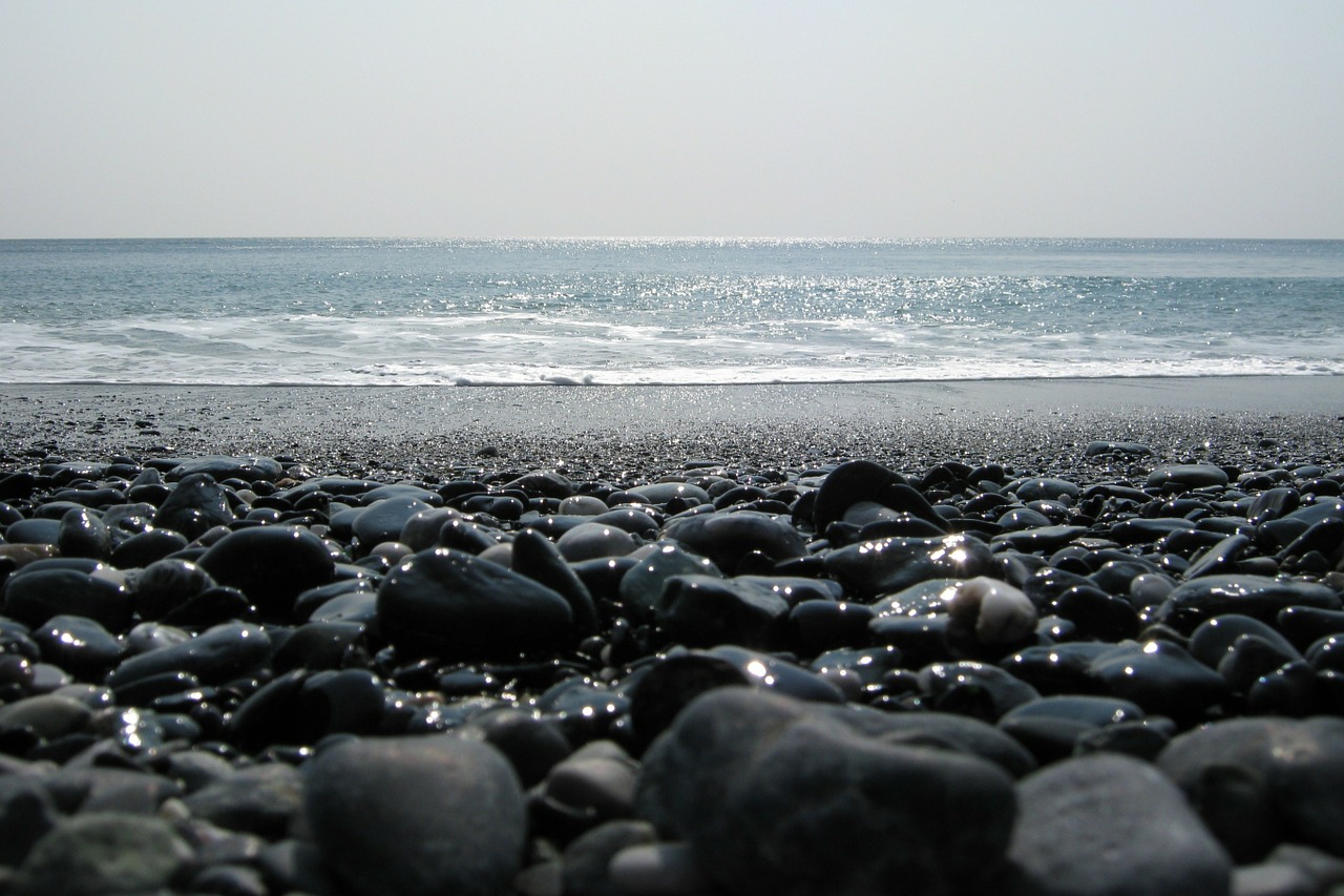 beach stones sun free photo