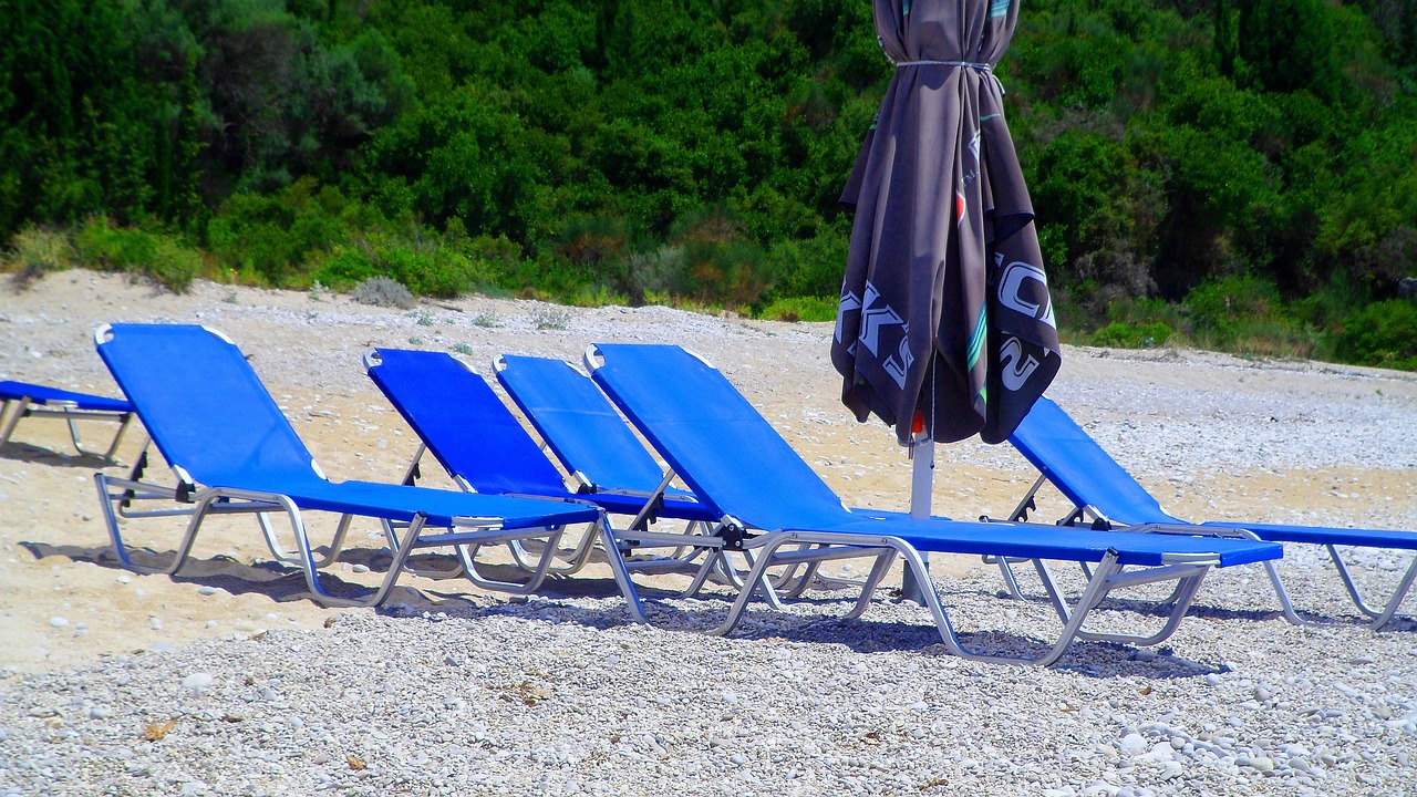 beach sunbed umbrella free photo