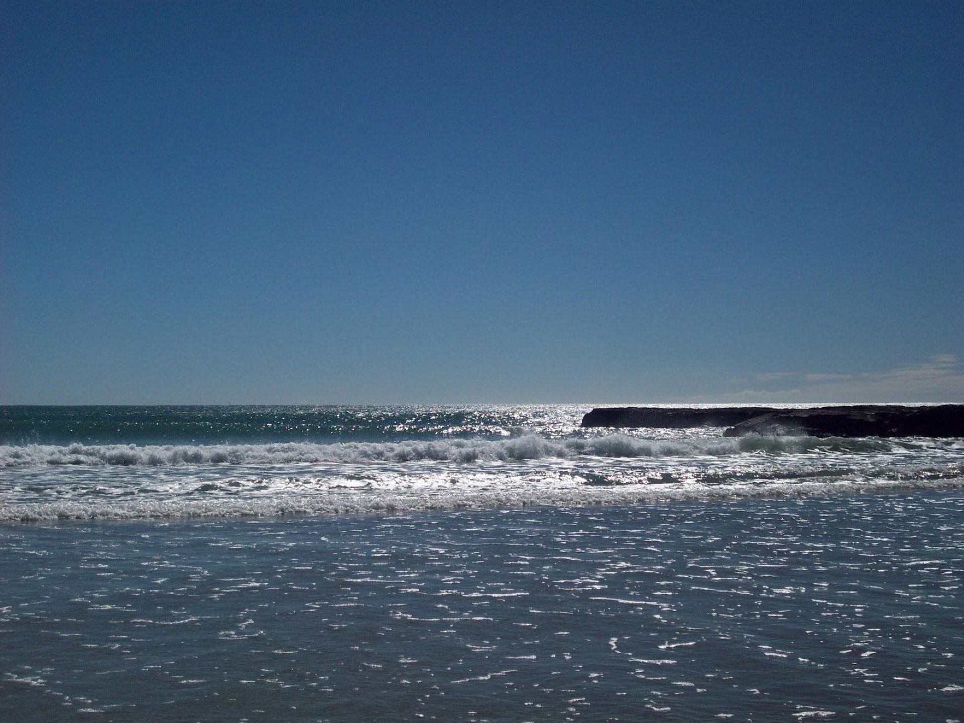 beach wave rocks free photo