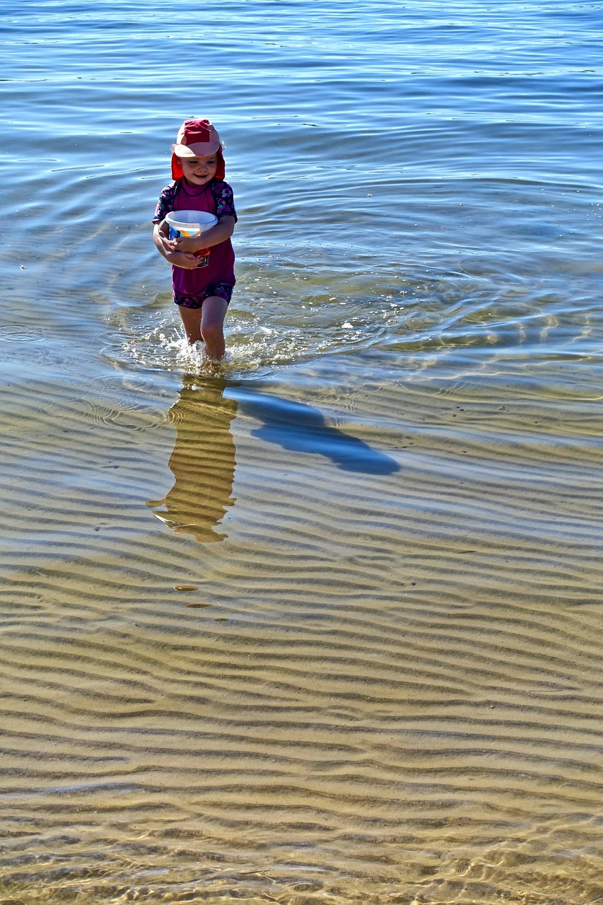 beach child playing free photo