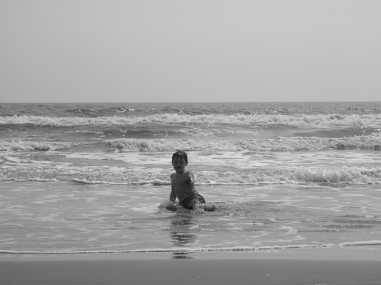 beach boy black and white free photo