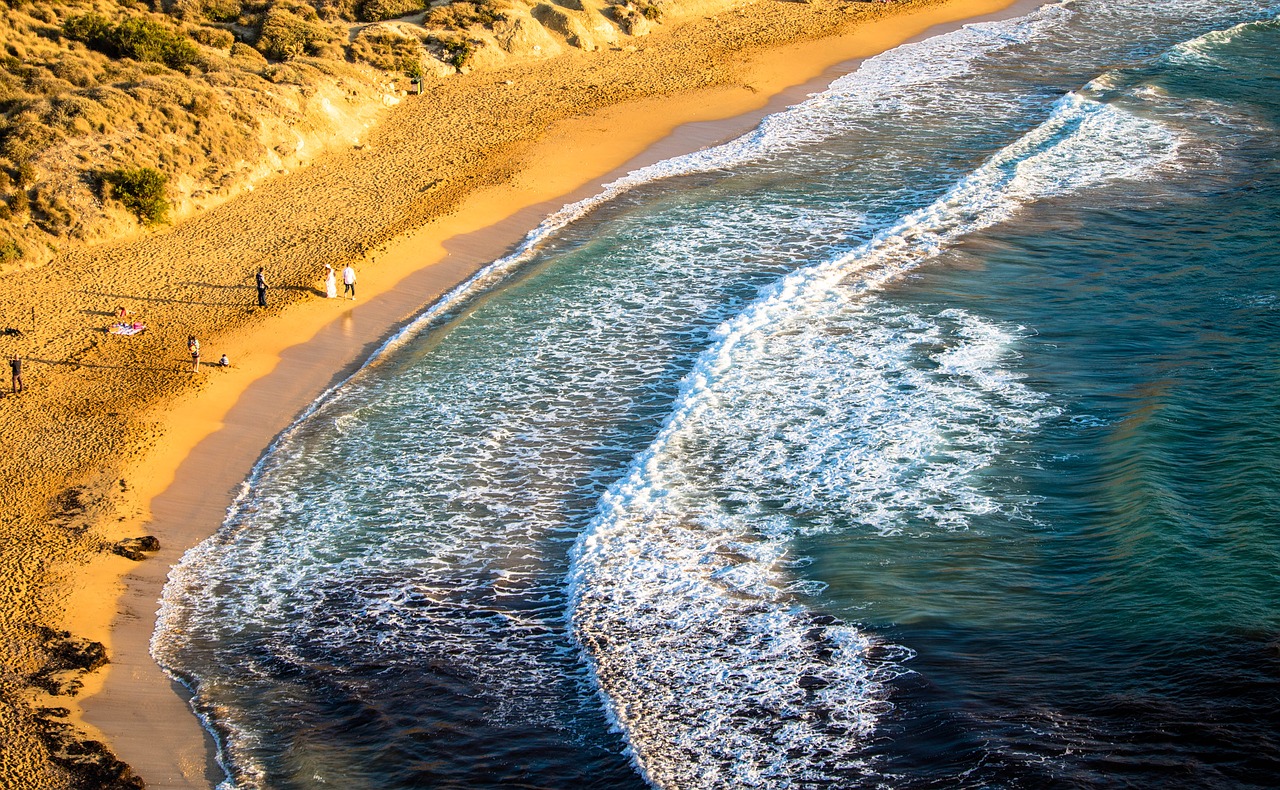 beach red sand sea free photo