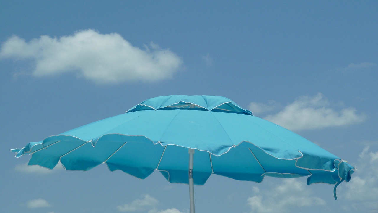 beach umbrella sky free photo