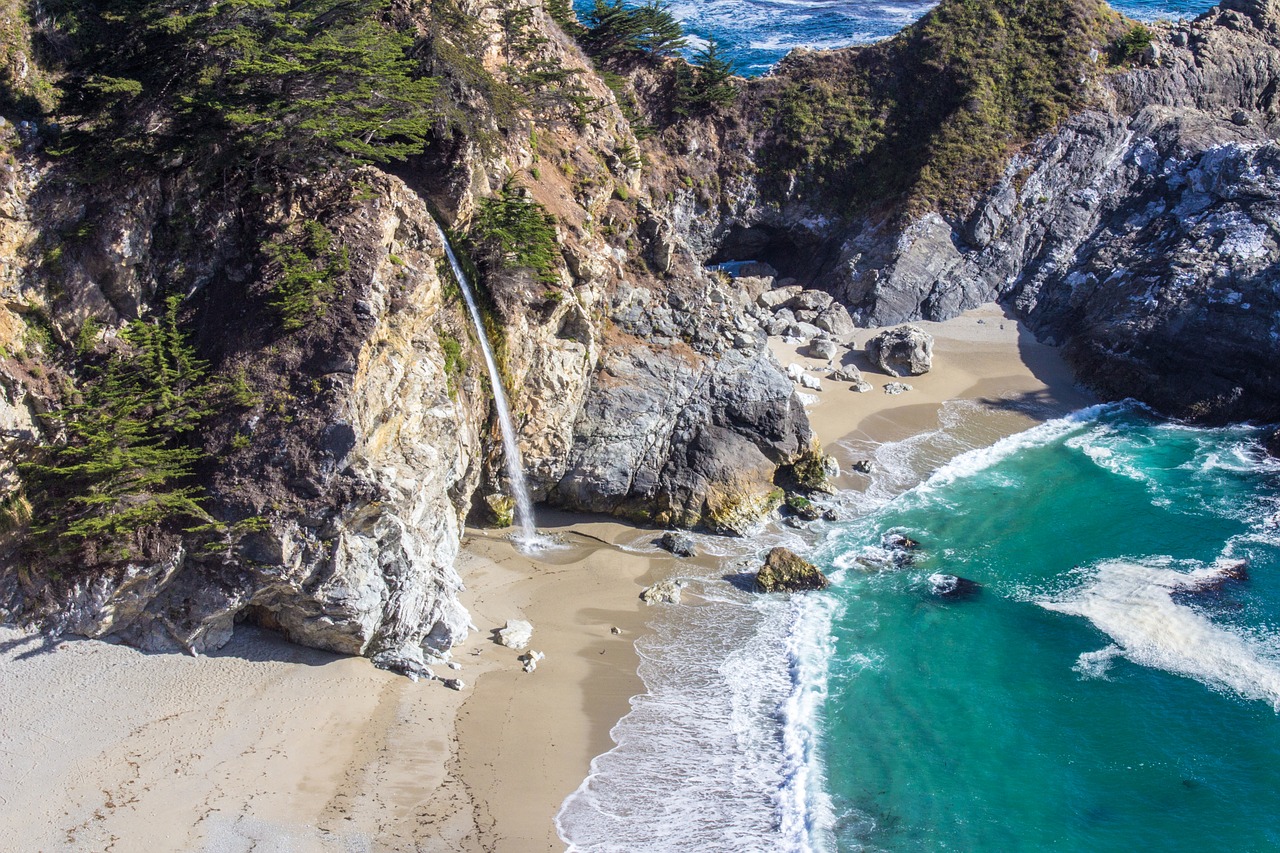 beach waterfall sea free photo