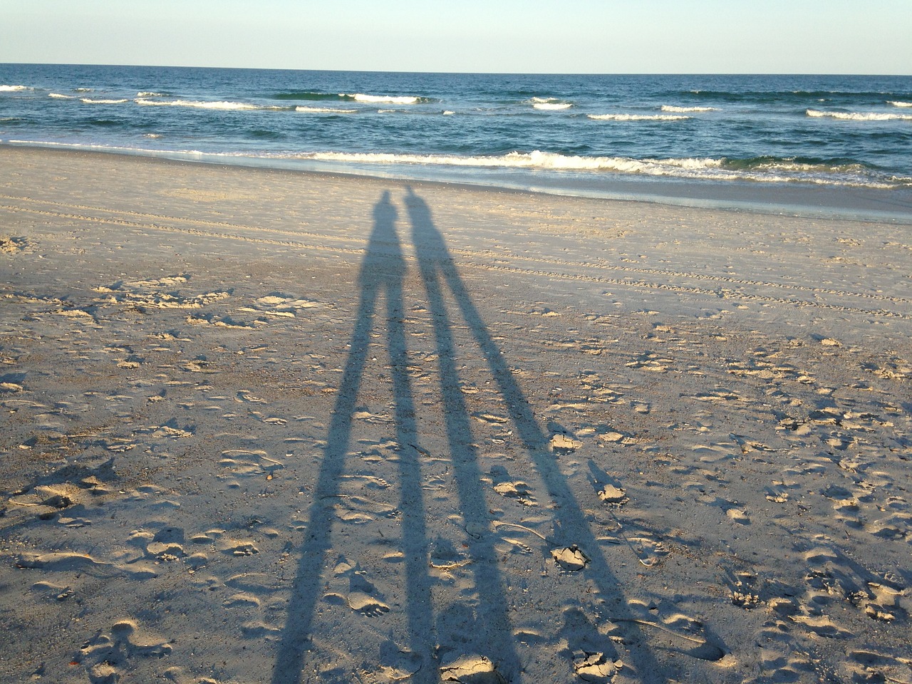 beach shadows ocean free photo