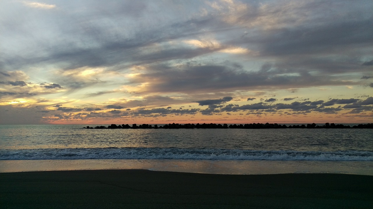 beach sunset at dusk free photo