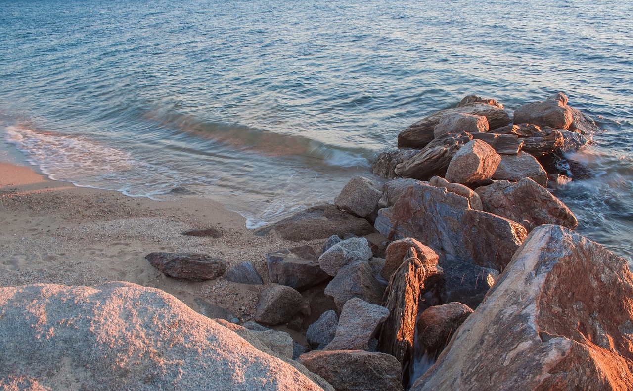 beach stones sea free photo