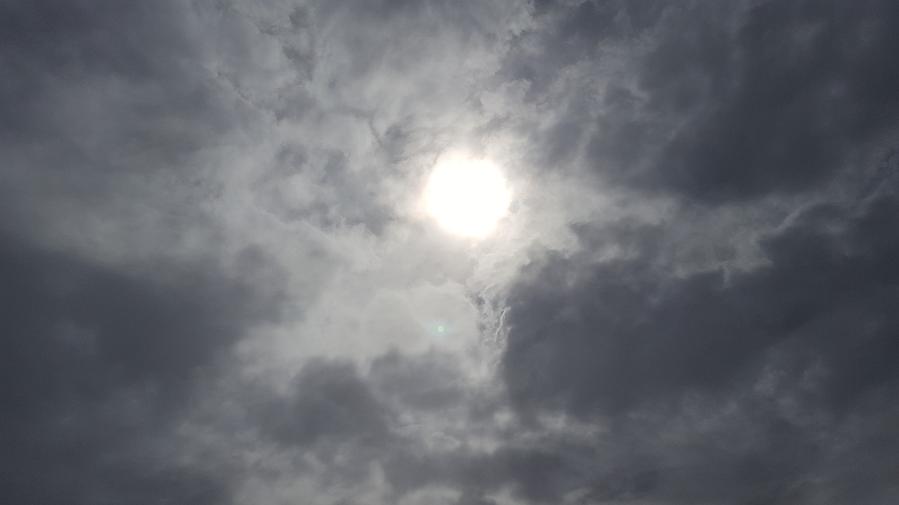 beach bright clouds free photo