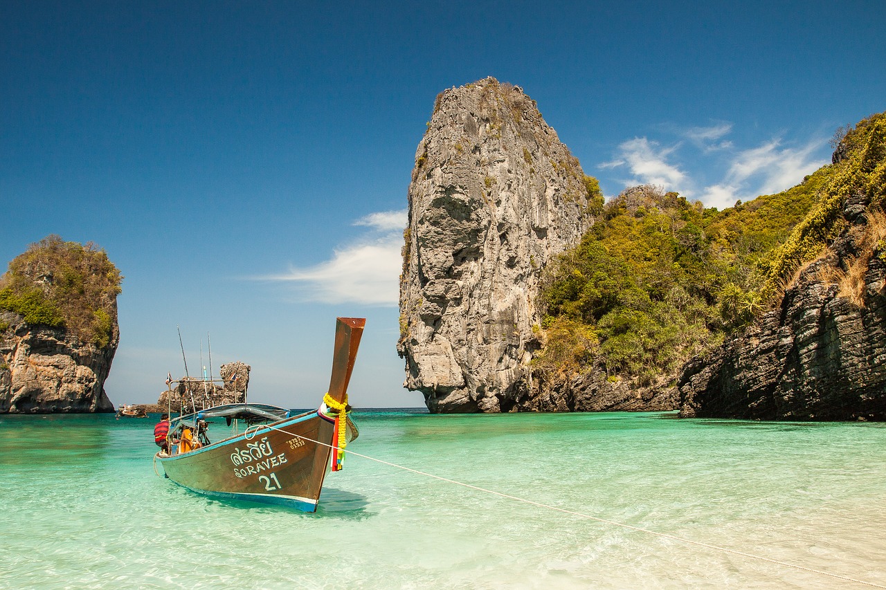 beach boat idyllic free photo