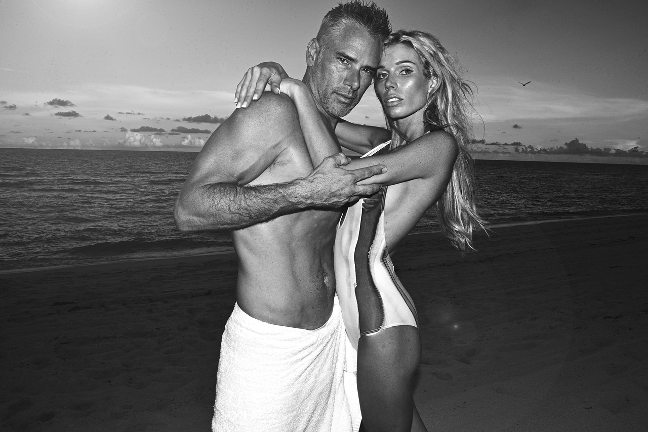 beach couple modeling free photo