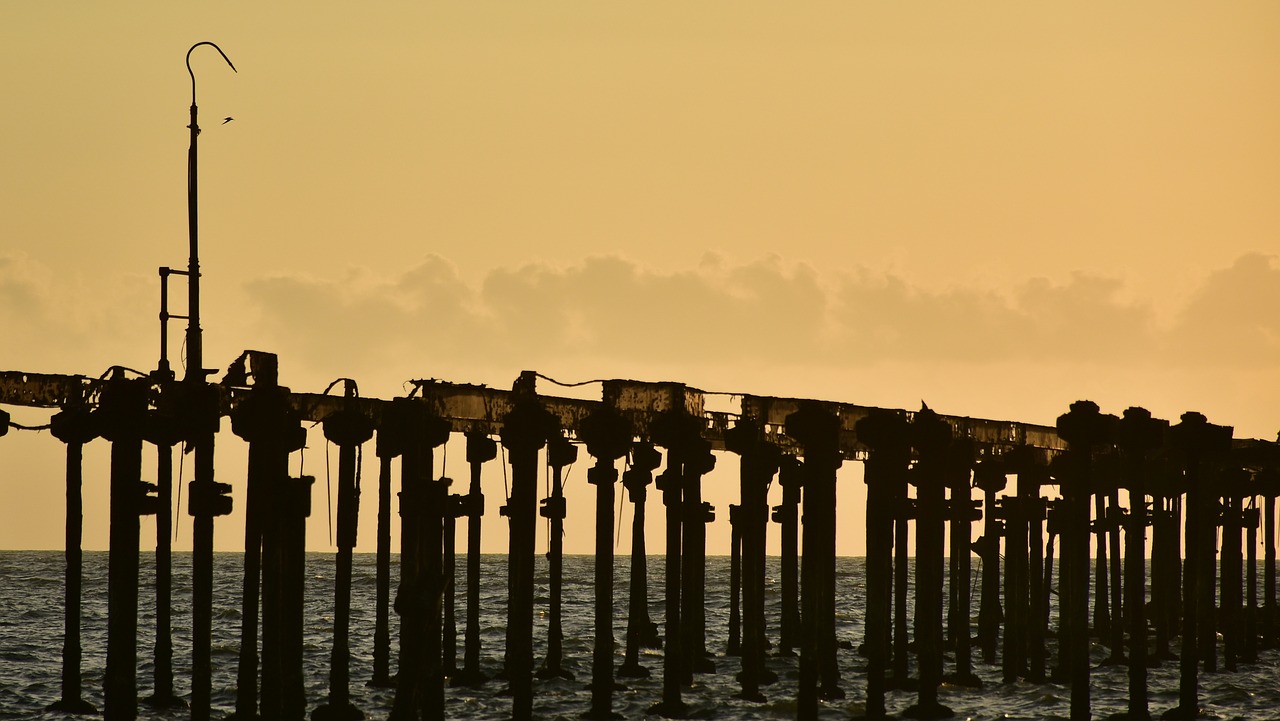 beach pier rotting free photo