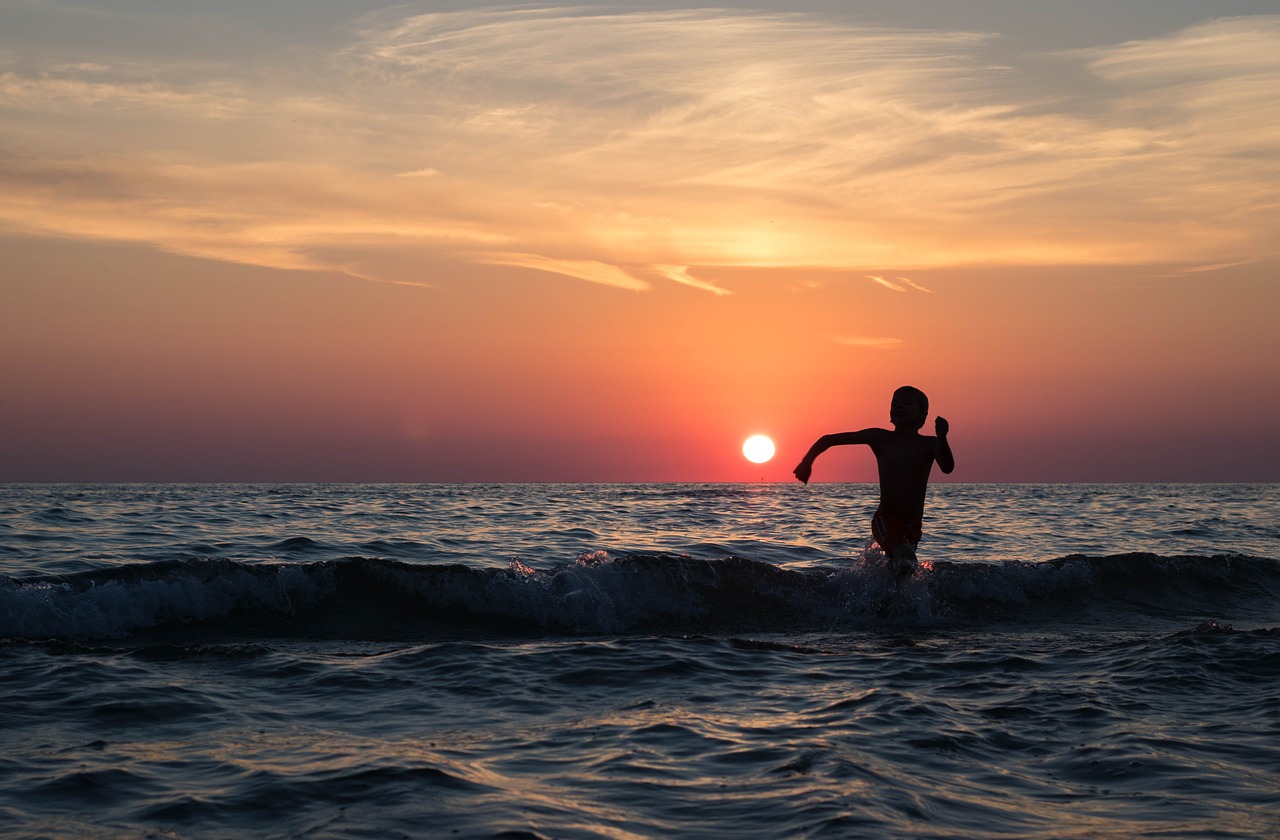 beach boy evening free photo