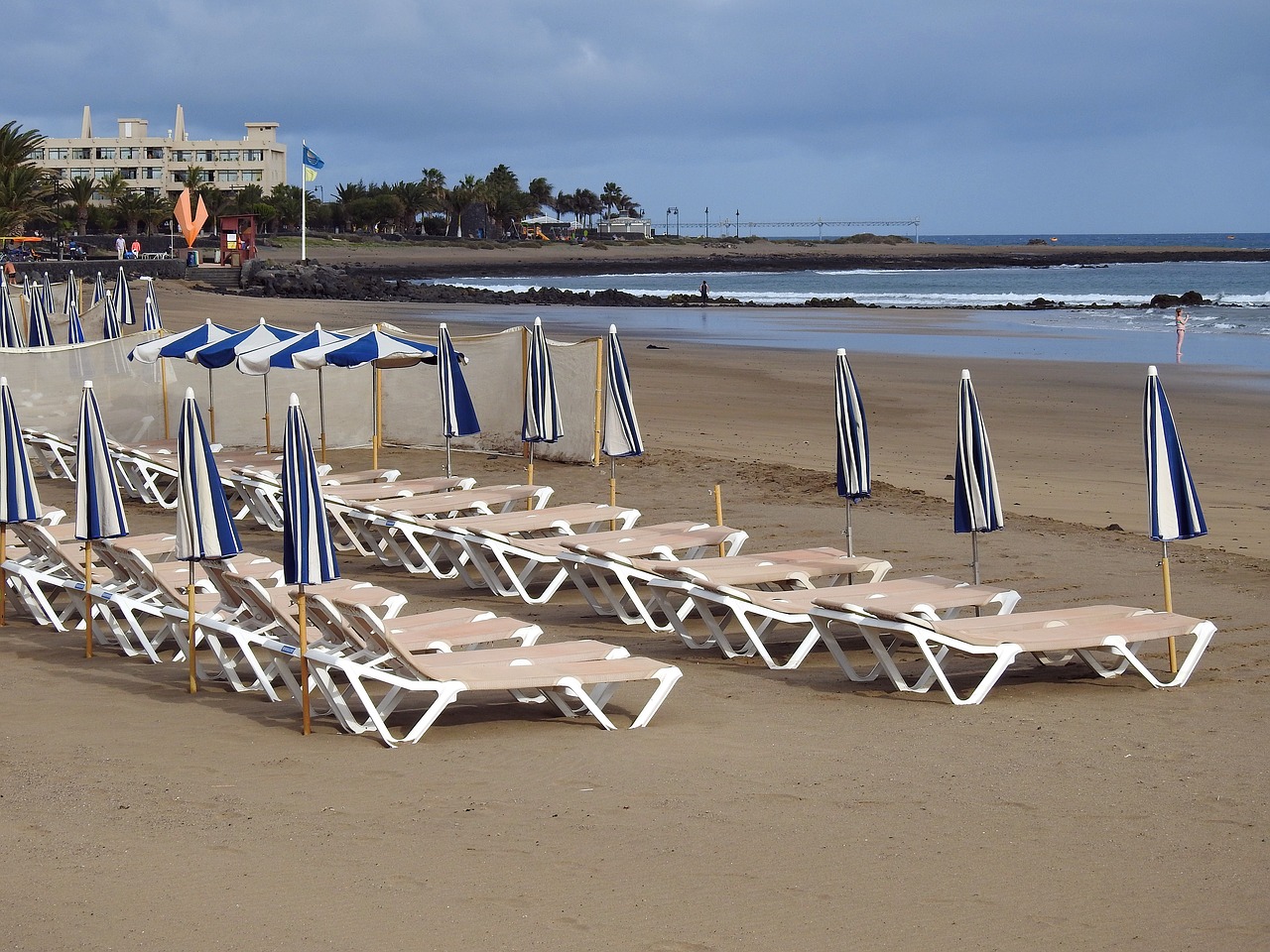 beach sun loungers parasols free photo