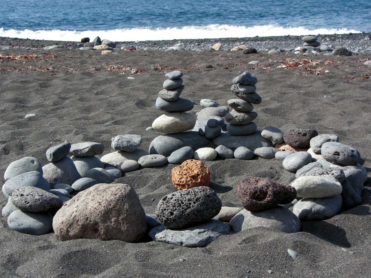 beach stones wave free photo