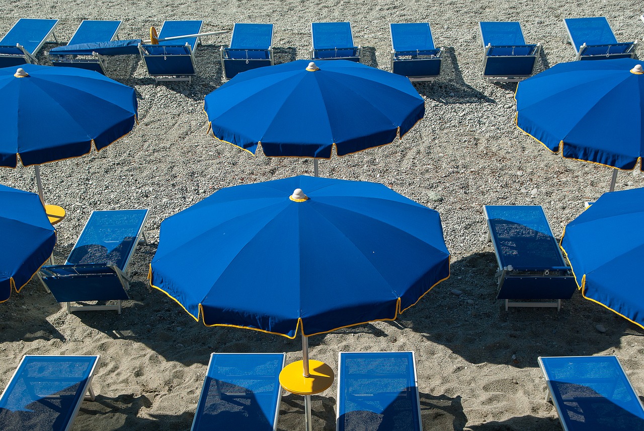 beach parasols sun loungers free photo