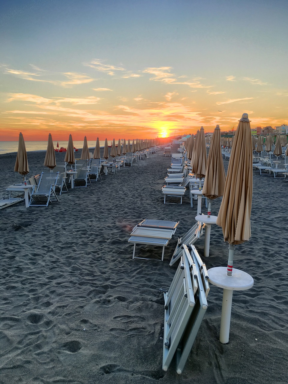 beach umbrellas sunset free photo