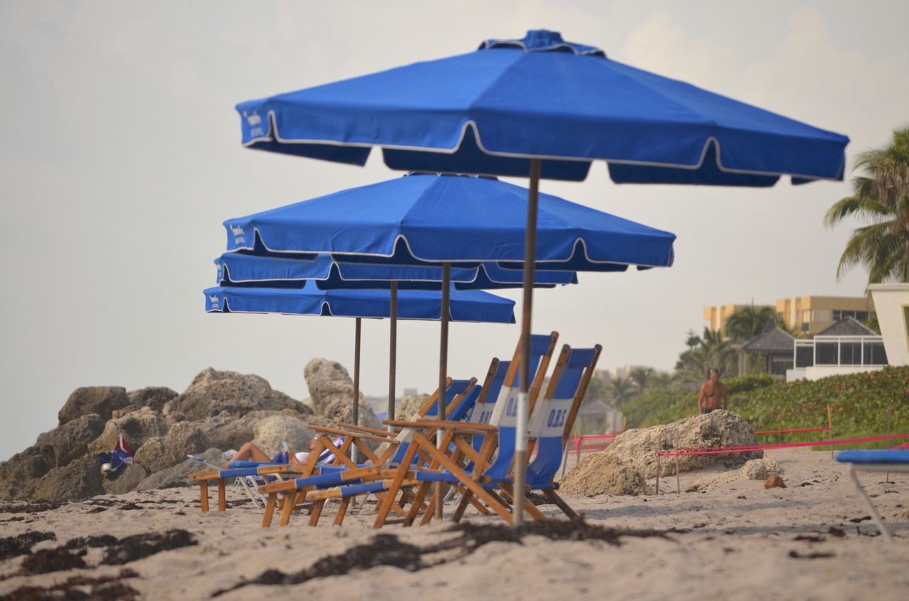 beach beach chairs beach umbrellas free photo