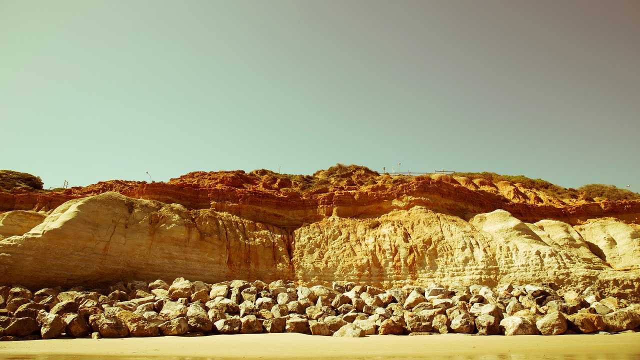 beach sand rocks free photo