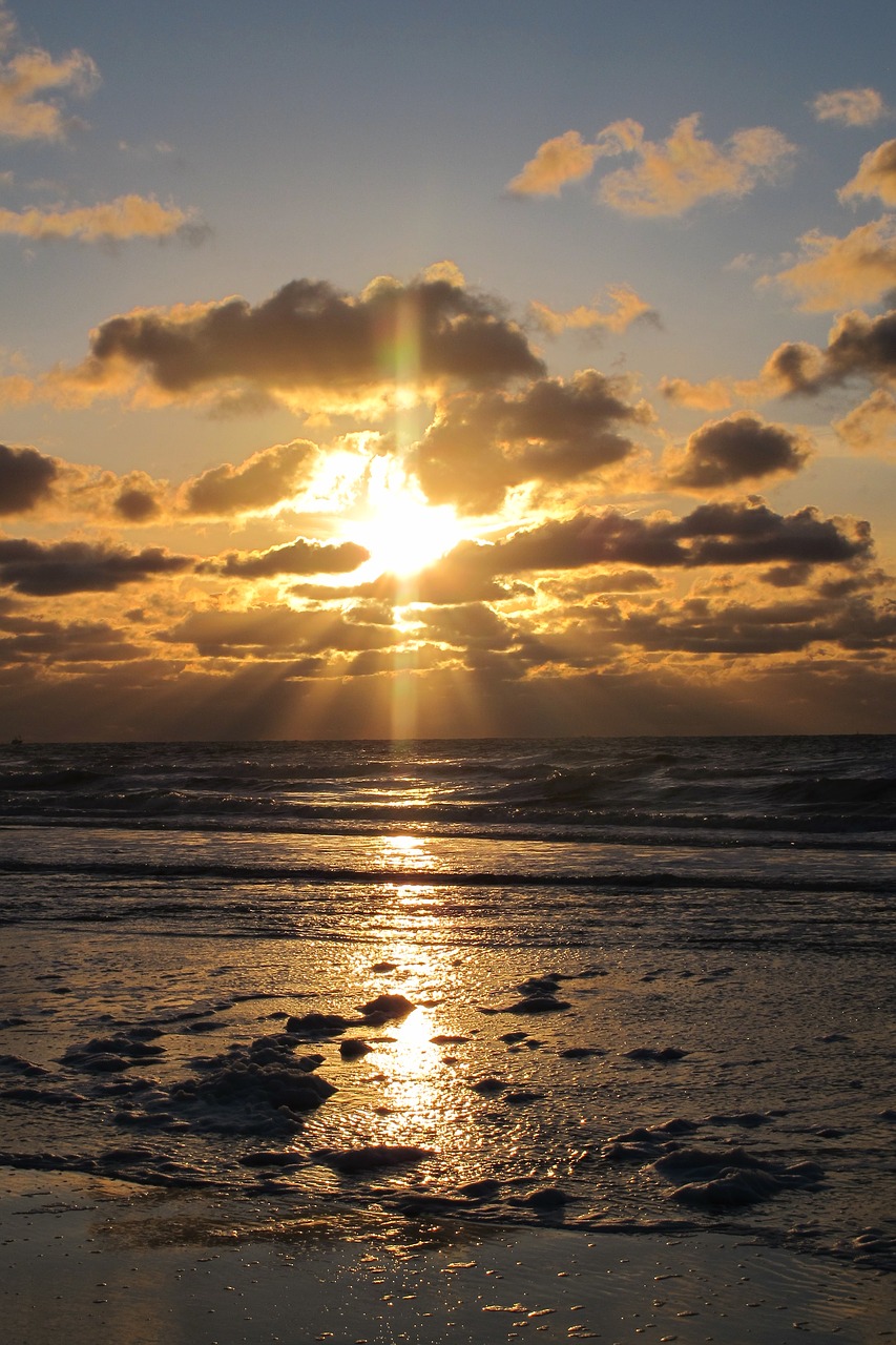 beach sunset sun and clouds free photo