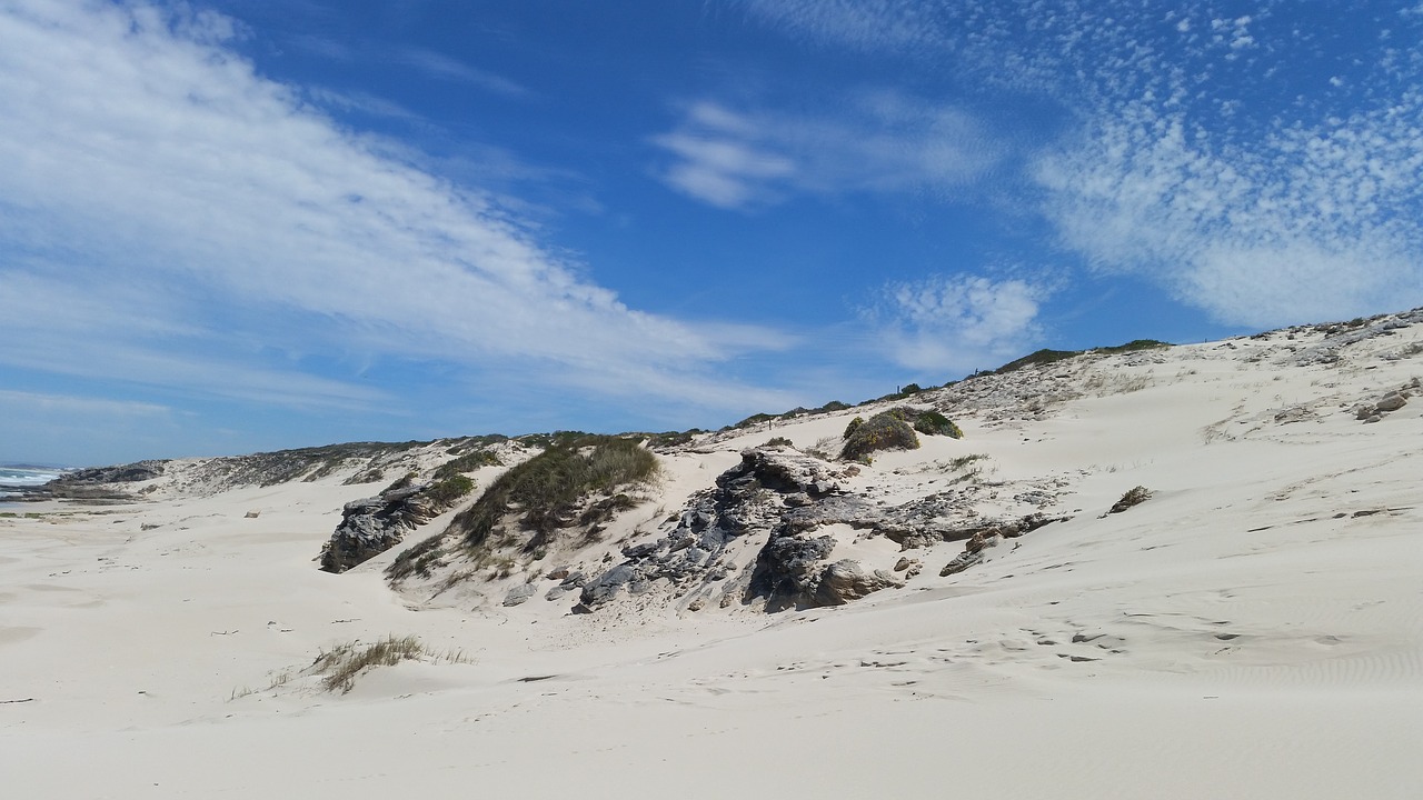 beach rocks sky free photo