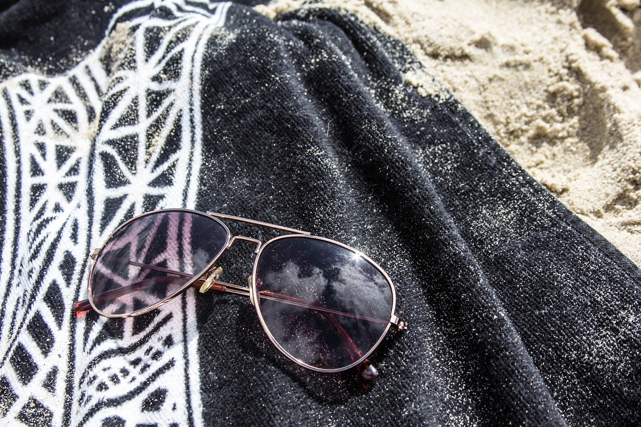 beach sun glasses towel free photo