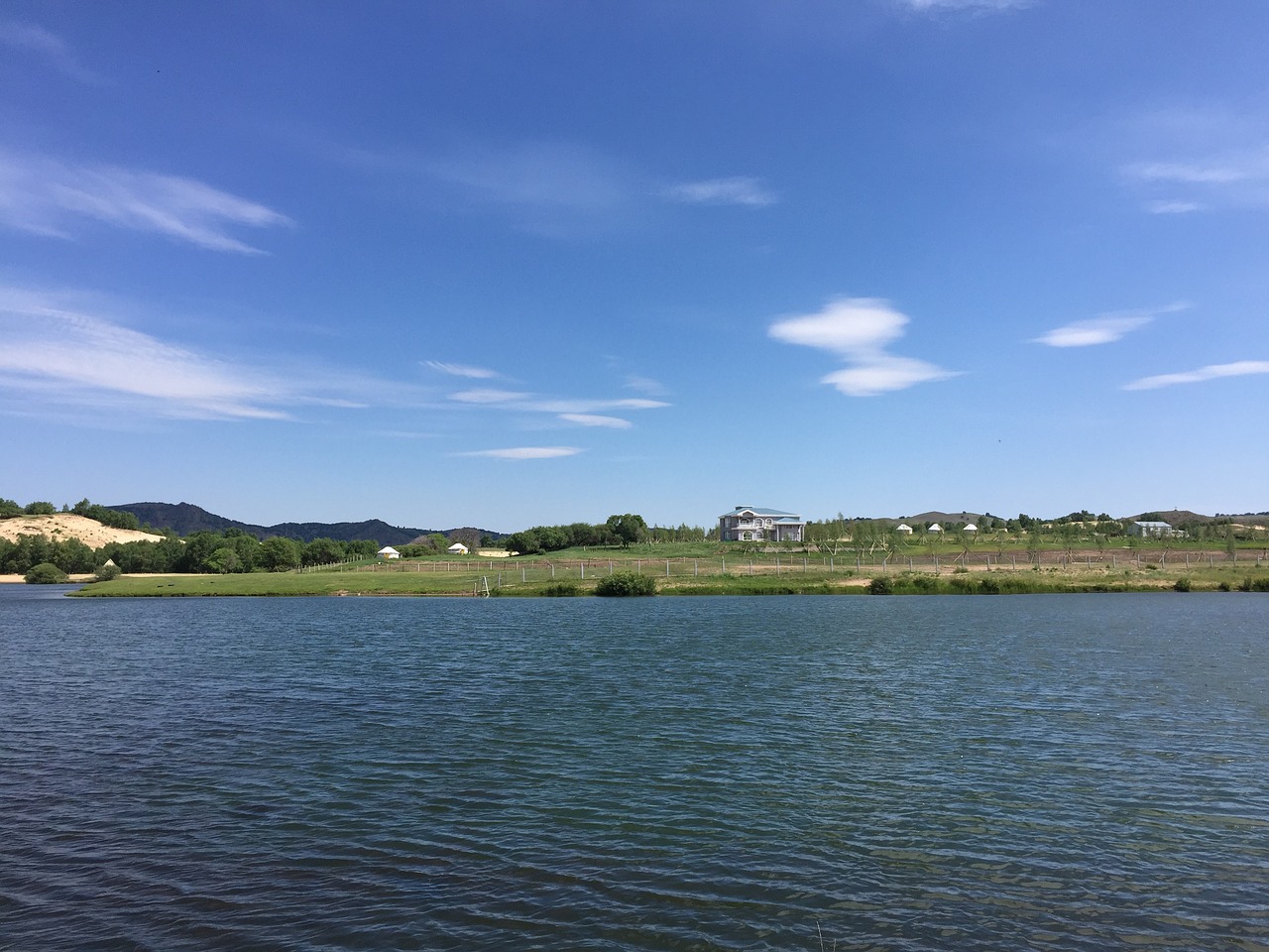 beach lake blue sky free photo