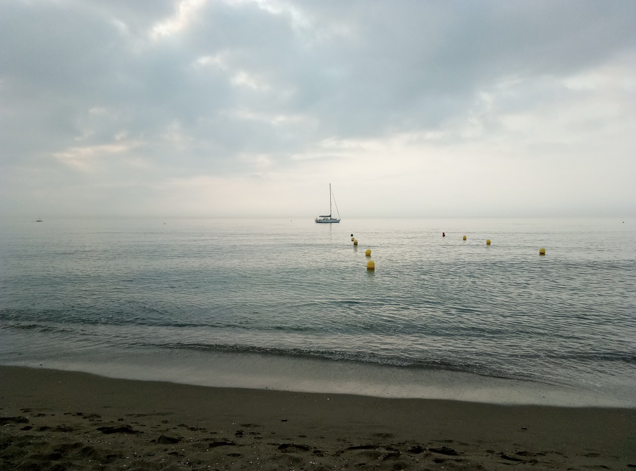 beach mediterranean clouds free photo