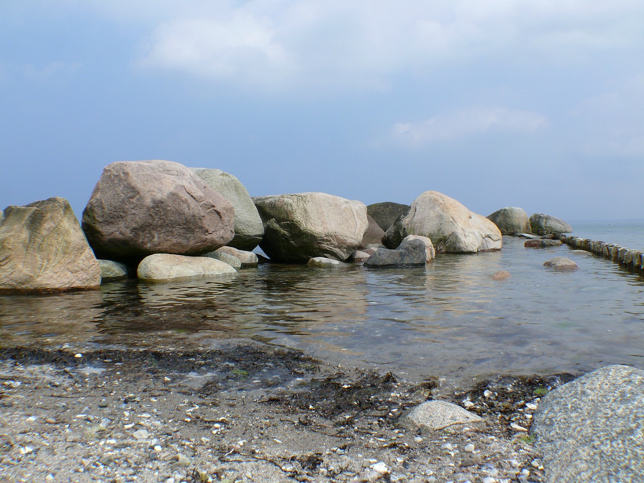 beach stones sea free photo