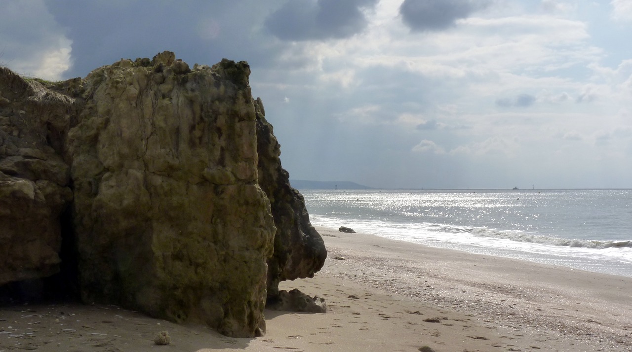 beach sand rock free photo