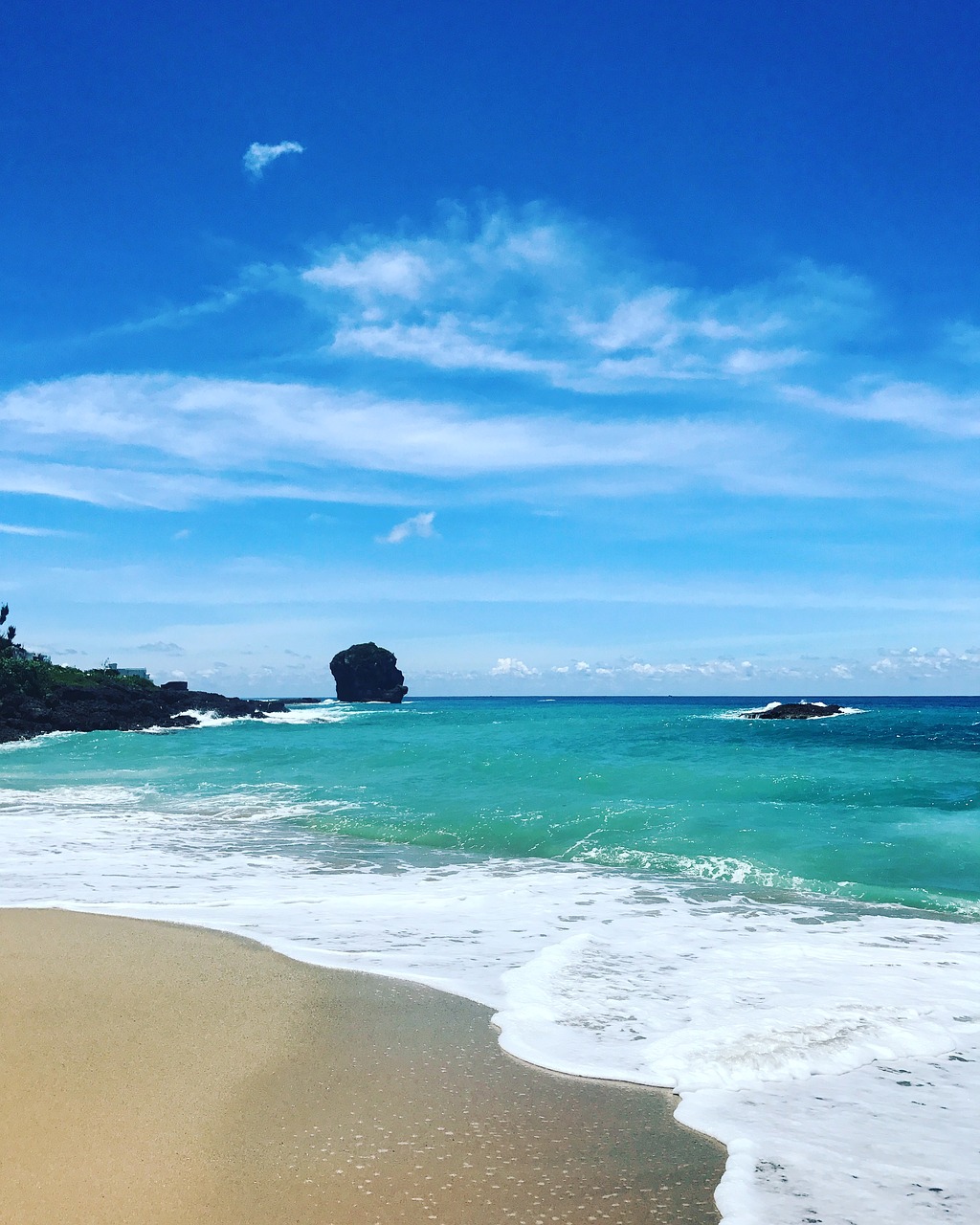 beach  stone  blue sky free photo