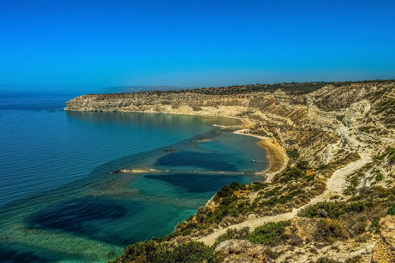 beach  cliffs  sea free photo