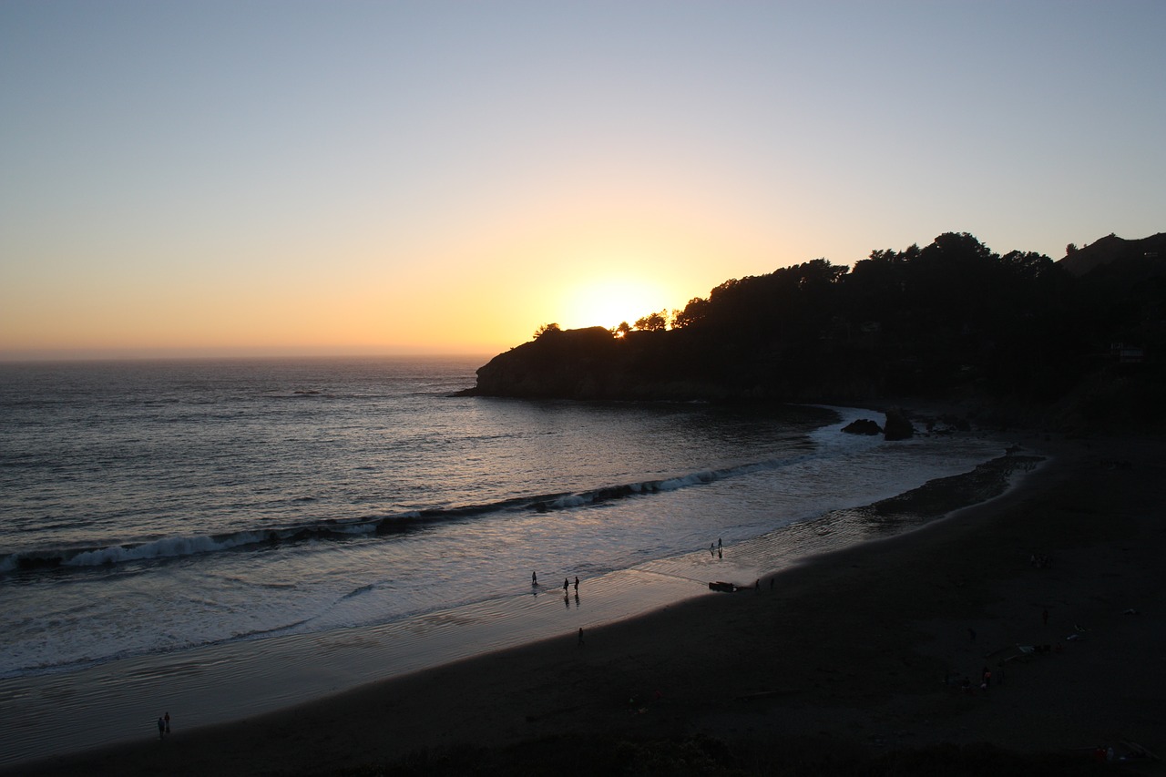 beach  sunset  dusk free photo