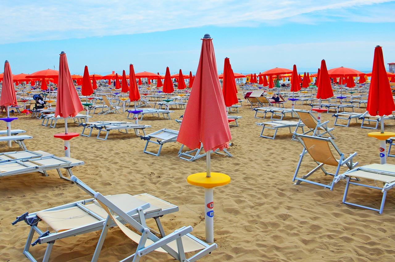 beach  parasol  sun loungers free photo