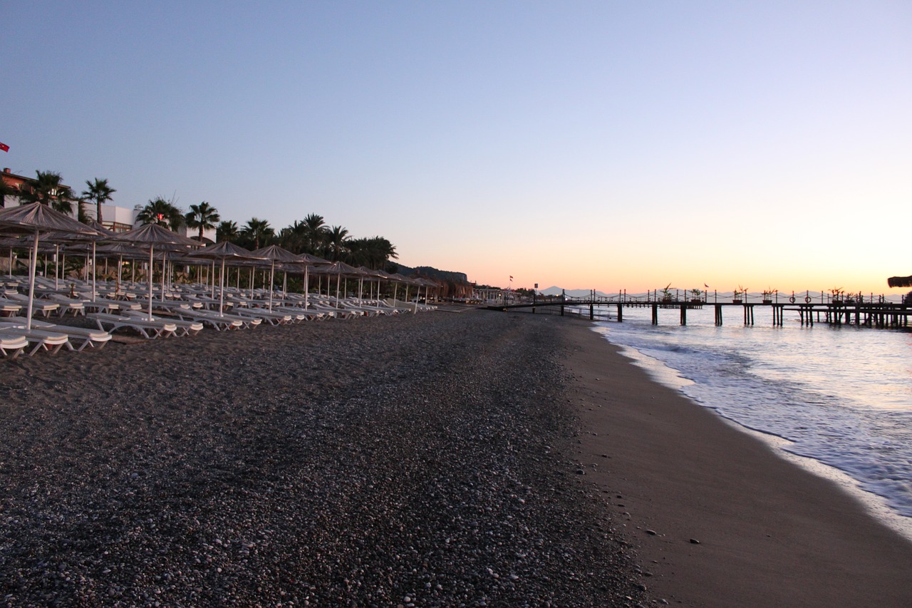 beach  pebble  sunrise free photo