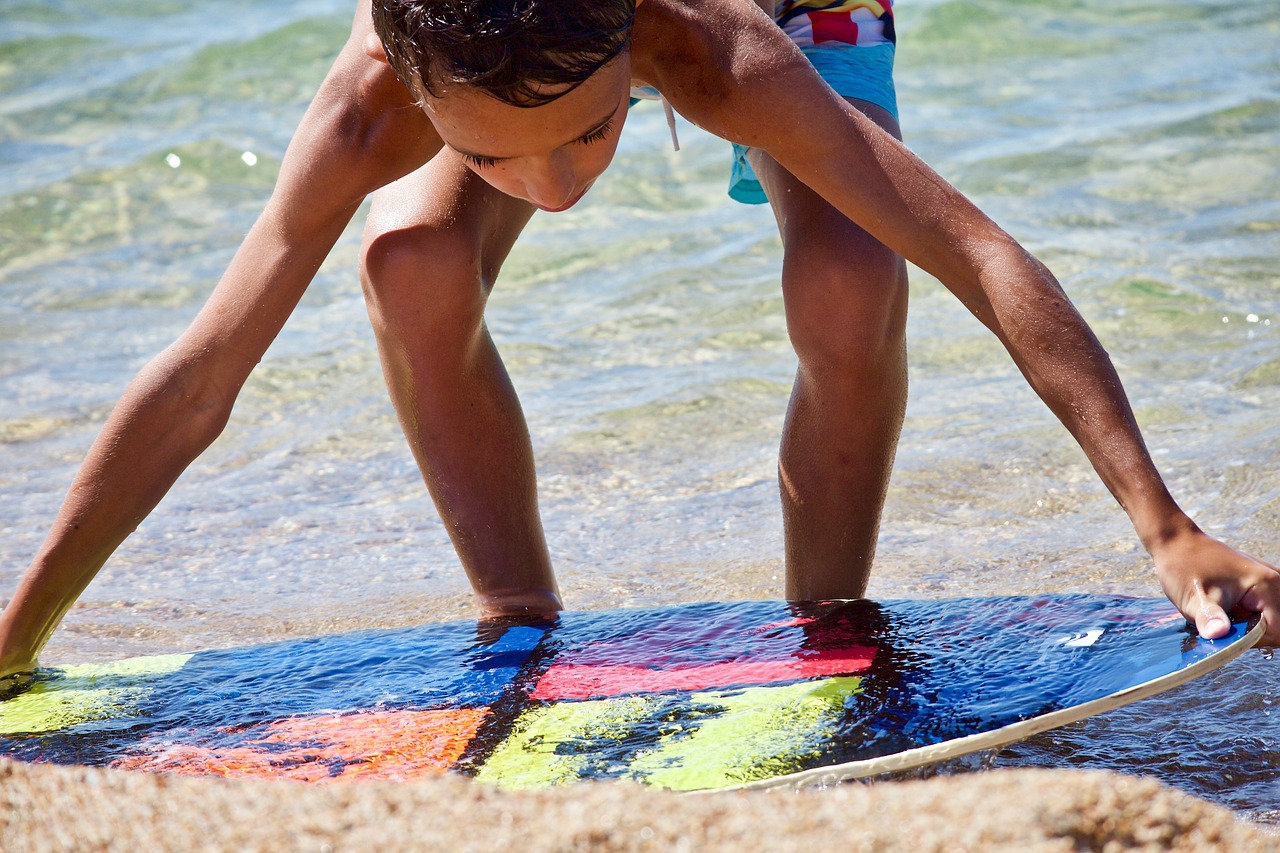 beach  beach children  surfing free photo