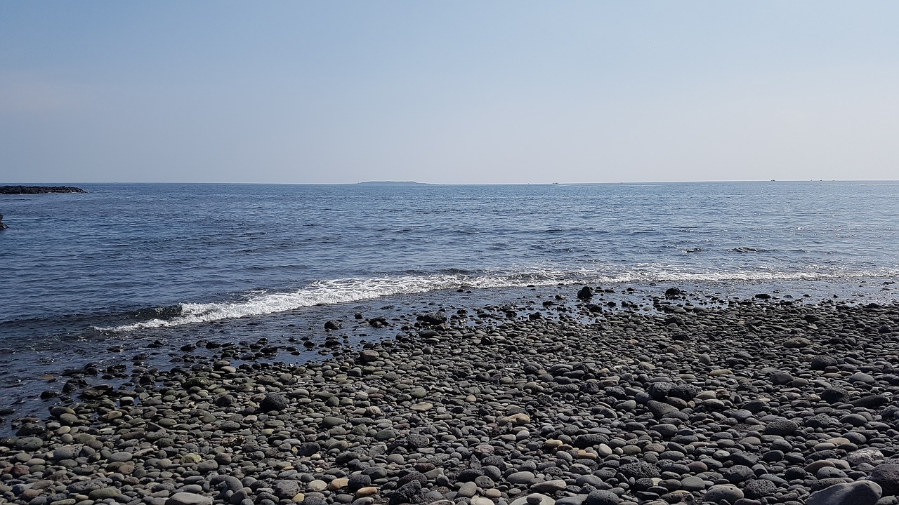 beach  jeju island  gravel free photo