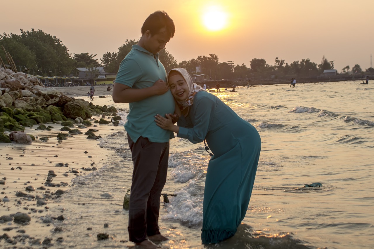 beach  mother  couple free photo