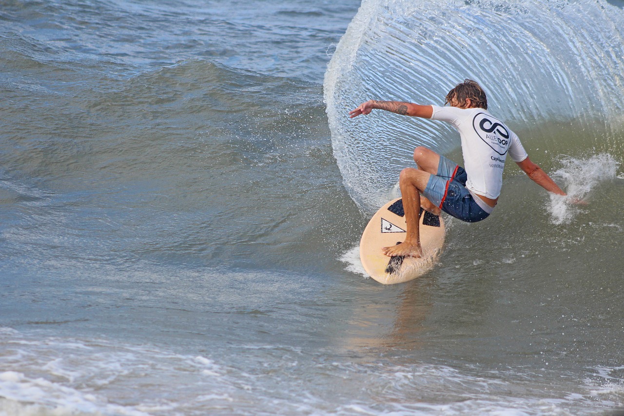 beach  skimboarding  outdoor free photo