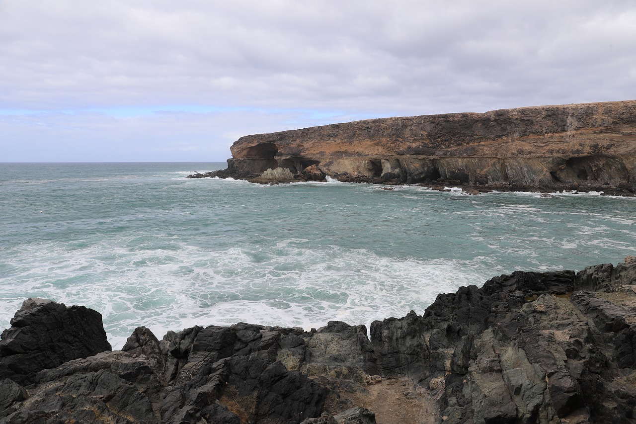 beach  cliffs  sea free photo