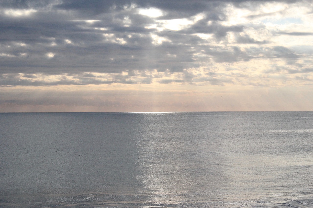 beach  sunrise  clouds free photo