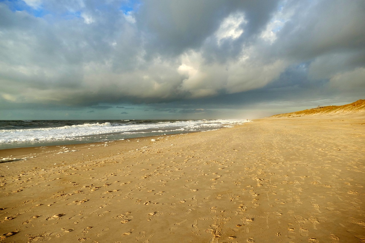 beach  clouds  north sea free photo