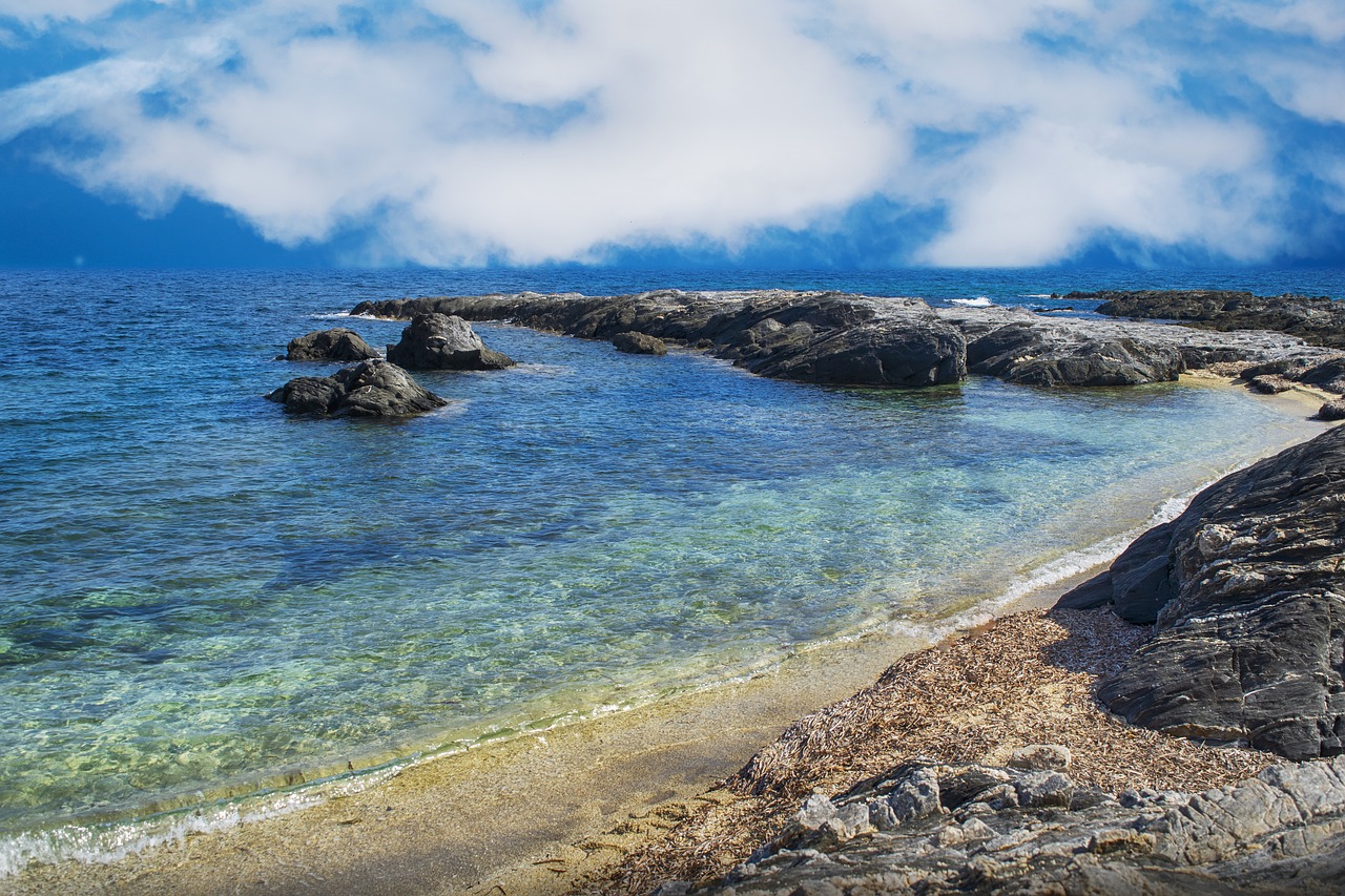 beach  rock  sky free photo