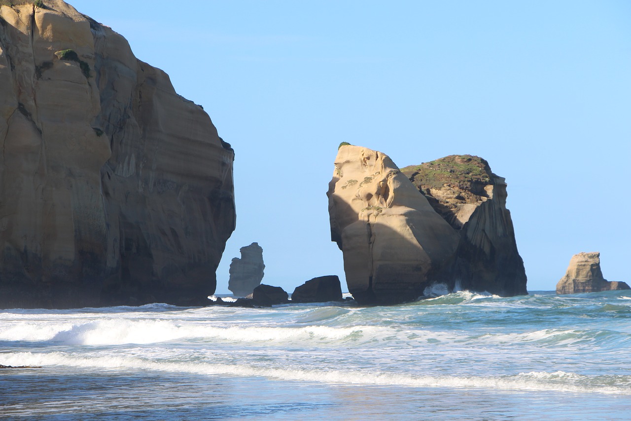 beach  rocks  sea free photo