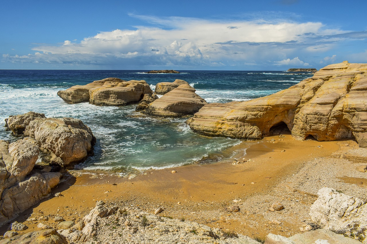 beach  sand  rocks free photo