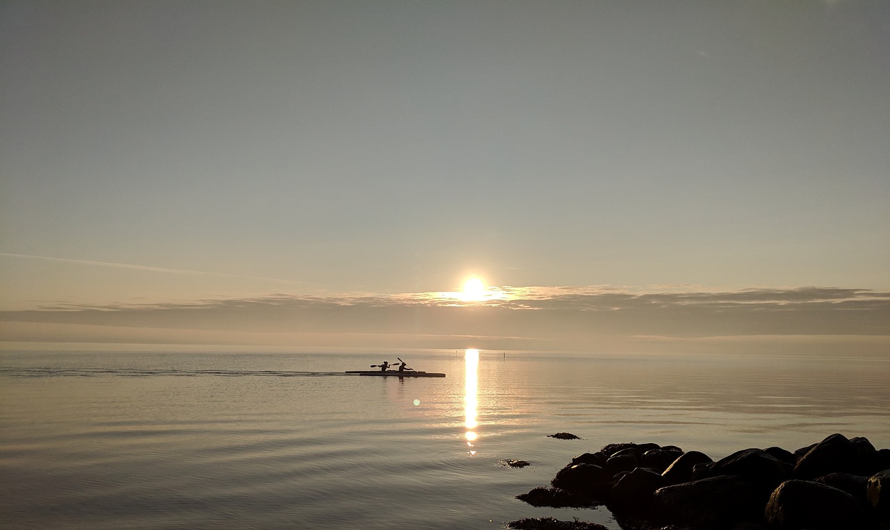 beach  kayak  sunrise free photo